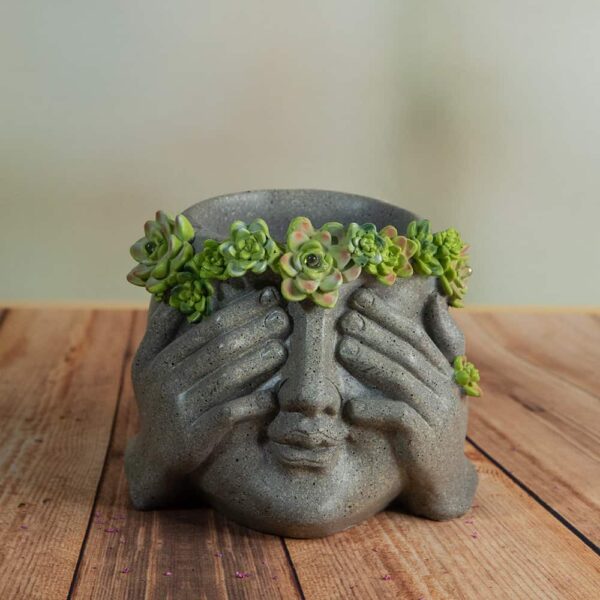 Illuminated flowerpot - Closed eyes